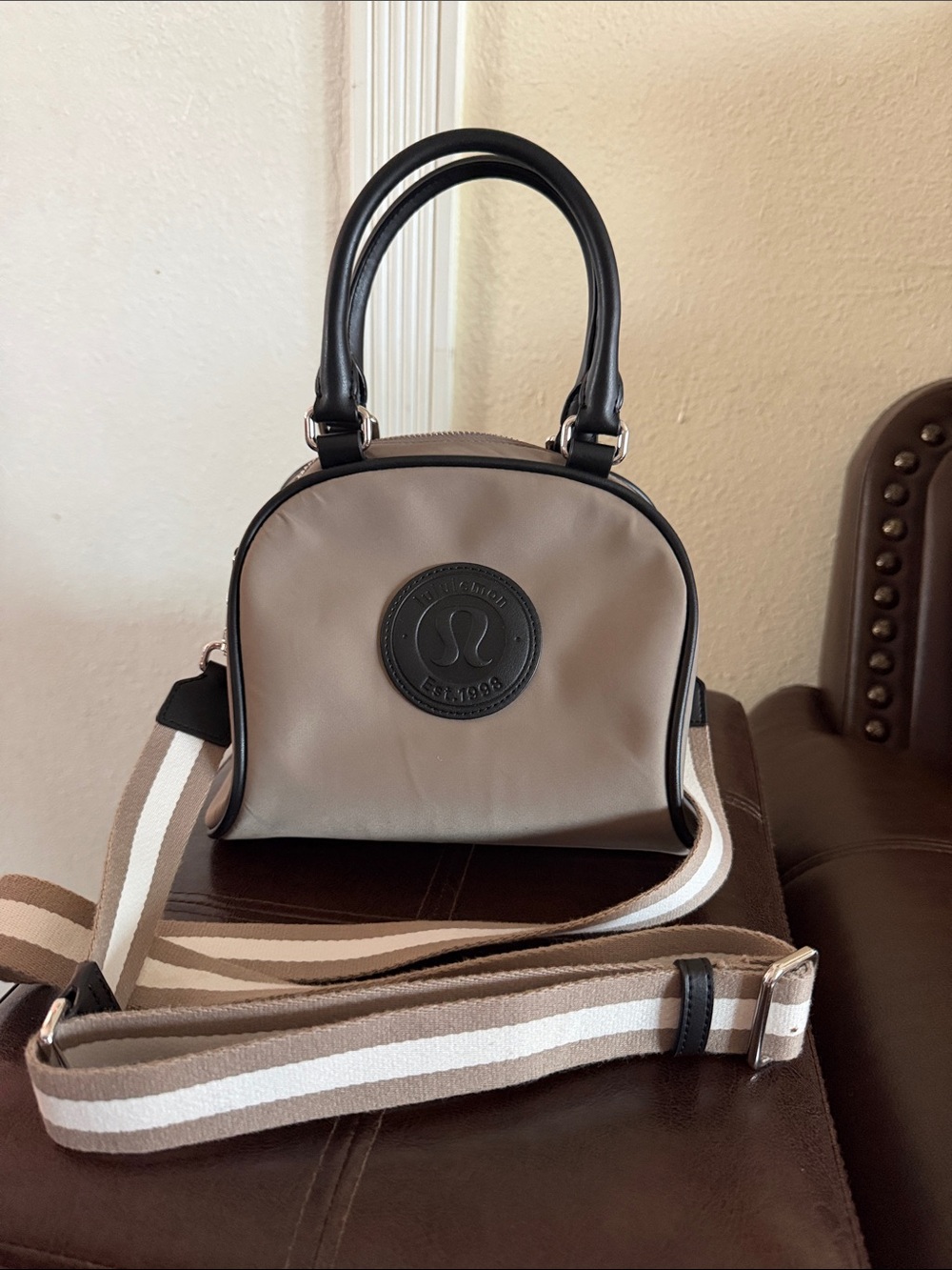 lululemon athletica Taupe Dome Crossbody with Black Trim and Striped Strap